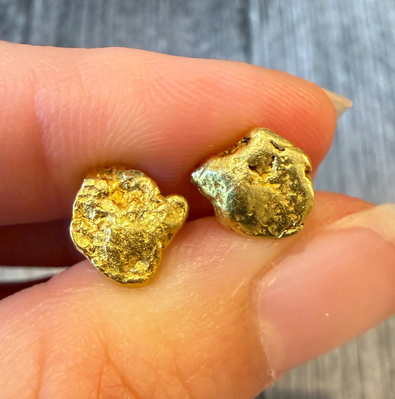 Gold Nugget Stud Earrings: Metal: 22-18K gold nuggets with 14K gold earring posts and backs Weight: 2.9 gramsMeasurement: 0.3 inches longMarkings: "14K" on earring stemCondition: In very good condition with some minor surface