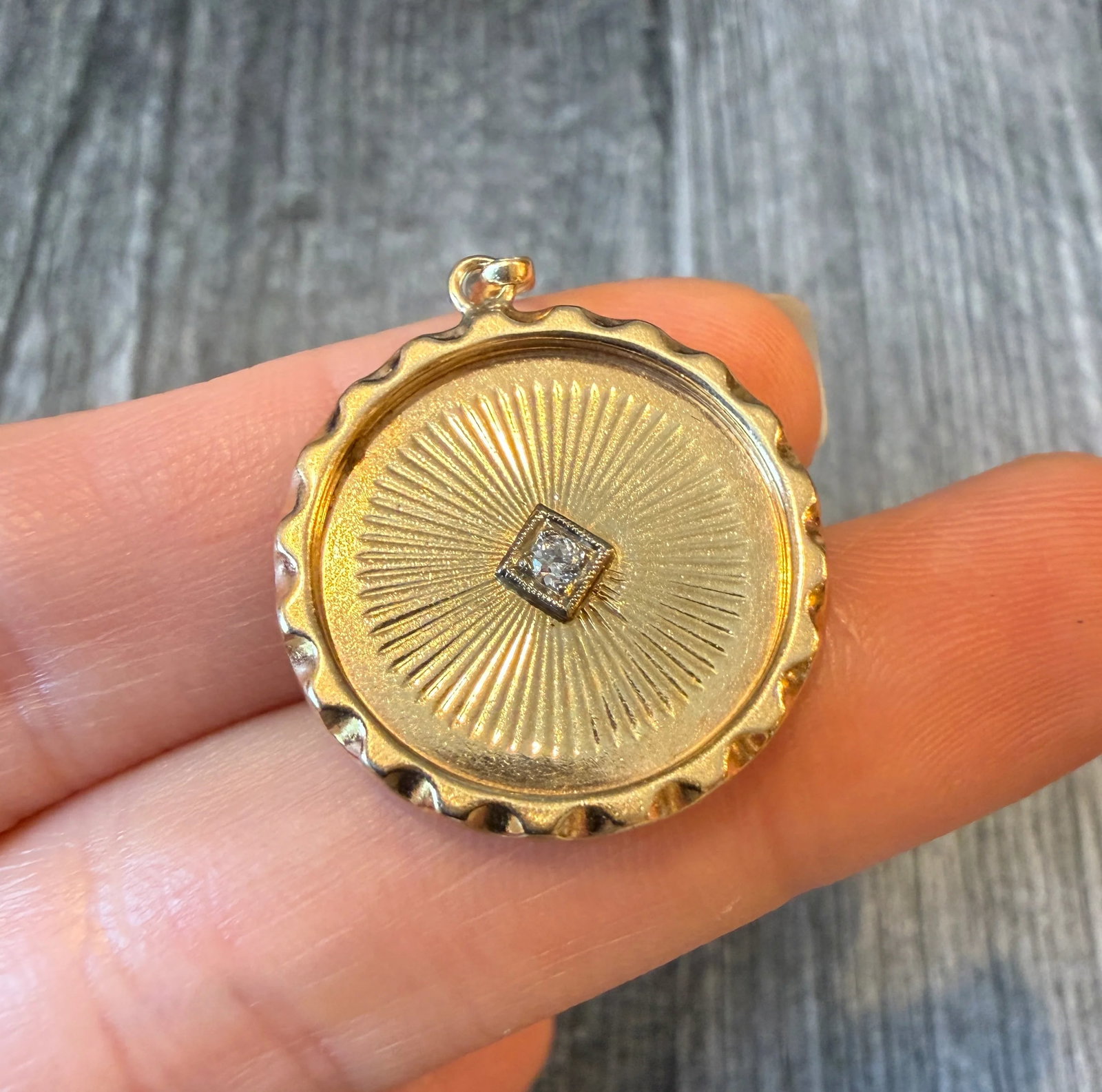 Engine Turned Diamond Disc Charm with Wavy Border in 14K Gold: Metal: 14K Yellow GoldWeight: 3.8 gramsMeasurements: 0.9” wideDiamond: Approximately 0.07 caratsMarkings: "14K" and inscribed “Love Stephen Rosemary Karen 1958”Condition: In good conditi