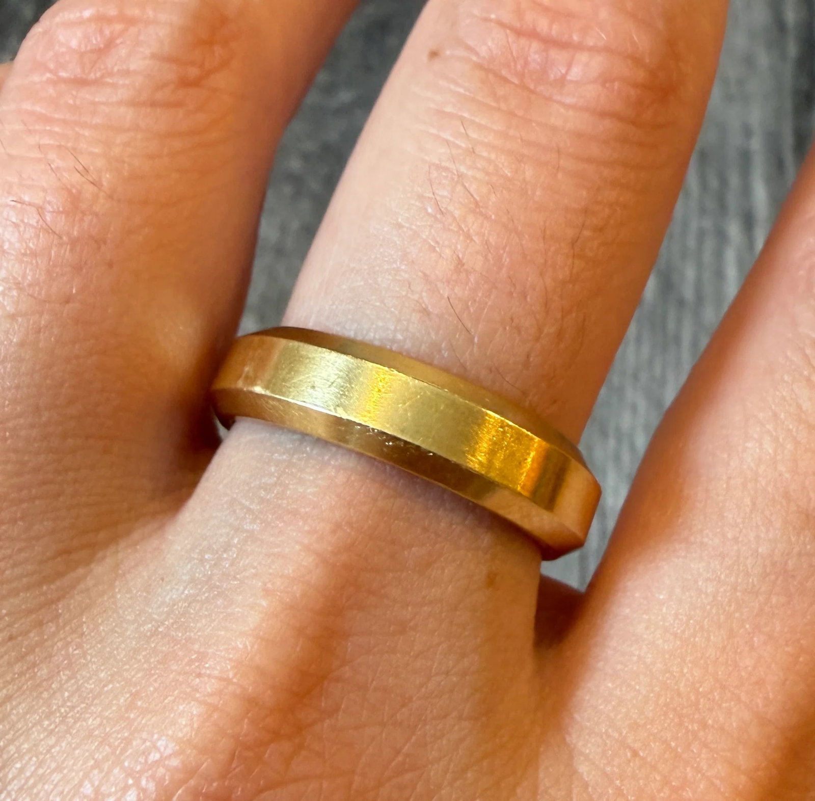 David Yurman 18K Gold Beveled Edge Band, Size 9 (I): Metal: 18K Yellow Gold Weight: 12 gramsRing Size: 9 (not resizable)Width: 5.7 mm wideMarkings: "D. Yurman 750"Condition: In very good condition with some minor surface wear.