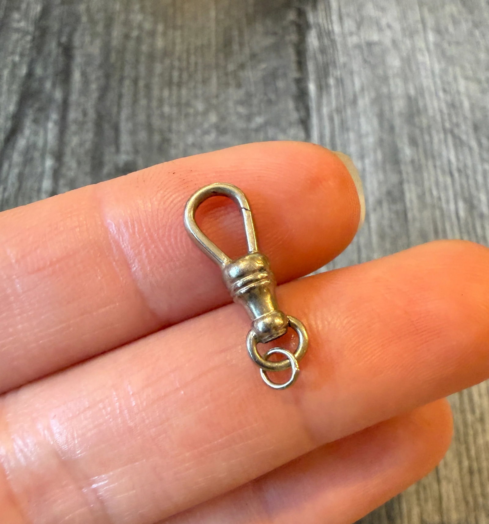 Antique 14K White Gold Dog Clip: Metal: 14K White Gold Weight: 1.2 gramsMeasurements: 0.75 inches long by 0.25 inches wide Markings: "14K"Condition: In very good condition with some minor surface wear.