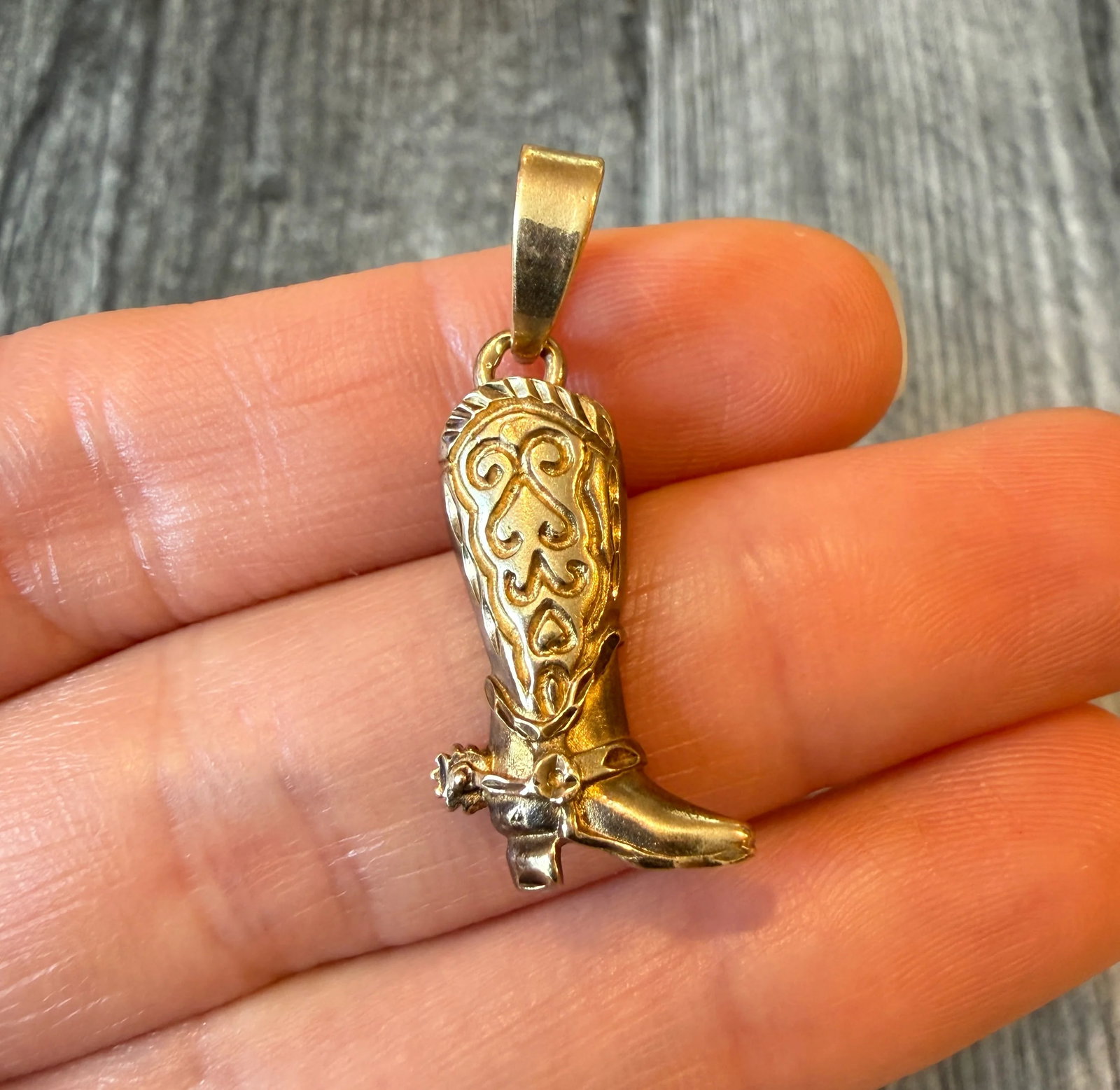 Vintage 14K Gold Cowboy Boot Charm: Metal: 14K Yellow Gold Weight: 3.7 gramsMeasurements: 1 inch long by 0.35 inches wideMarkings: "Ma 14K"Condition: In good condition with some minor surface wear and tarnish. The charm can be polished 