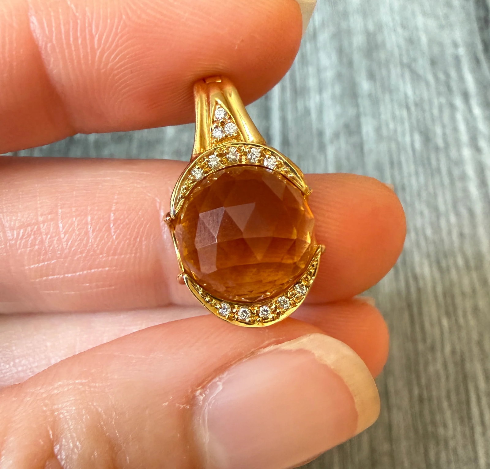 Faceted Citrine Ball and Diamond Charm in an 18K Gold Removable Frame: Metal: 18K Yellow Gold Weight: 6.6 gramsDiamonds: Approx 0.13 caratsMeasurements: 0.95 inches long by 0.5 inches wideMarkings: "750"Condition: In very good condition with some minor surface wear