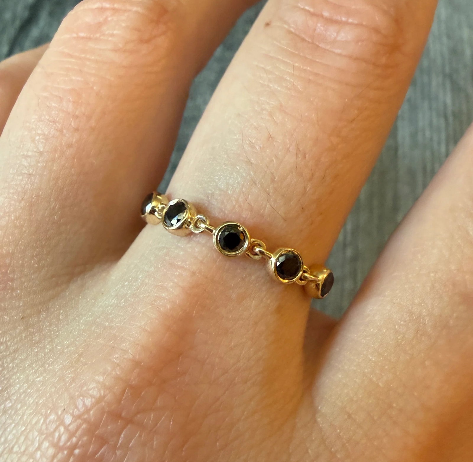 Black Diamond Chain Ring in 14K Gold: Metal: 14K Yellow Gold Weight: 1.9 gramsBlack Diamonds: Approximately 0.35 caratsRing Size: 9.25 (resizable)Markings: "14K"Condition: In good condition with some minor surface wear