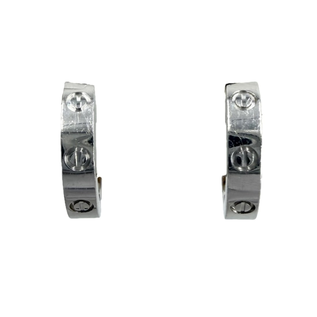 Cartier women's hoop earrings, Mini Love design, screw motif, small size, 18K white gold (Au750),: --- Catalog ---Category: SizeSize (HxWxD): 1.20mm x 0.20mm x 0.10mm / 0.05'' x 0.01'' x 0.00''Category: DesignType: Hoop earringsColor: White goldGender: WomenMaterial: White goldCategory: GeneralBran