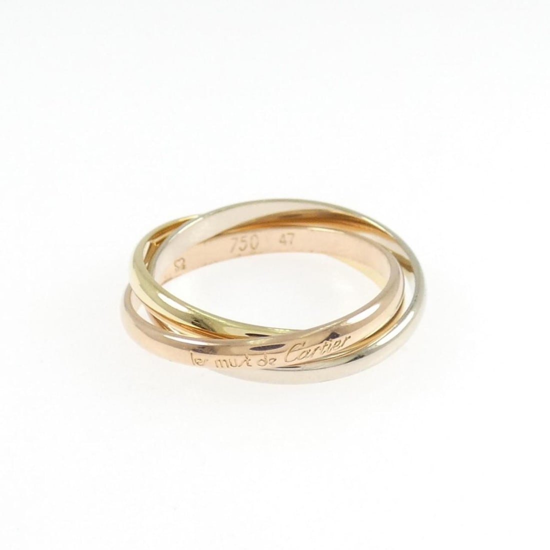 Cartier Trinity Ring: --- Catalog ---Category: SizeUS Size: 4Brand Size: 47Category: DesignType: Band ringGender: WomenMaterial: Pink gold (18K), White gold (18K), Yellow gold (18K)Category: GeneralBrand: Cartier--- Item