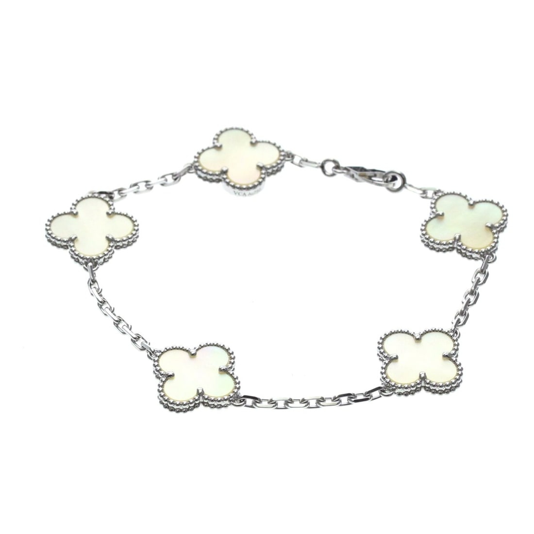 Van Cleef & Arpels Vintage Alhambra Bracelet White Gold (18K) Mother Of Pearl Charm Bracelet Silver: --- Catalog ---Category: SizeLength: 17.5cm / 6.88''Weight: 11.7g / 0.41oz.Stone Size (HxW): 1.5cm x 1.5cm / 0.59'' x 0.59''Category: DesignType: Charm braceletColor: SilverMetal: White GoldStone: Mot