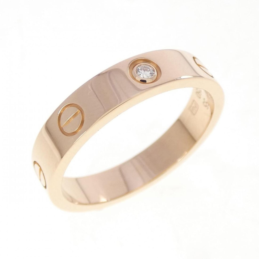 Cartier Mini Love 1P Ring: --- Catalog ---Category: SizeUS Size: 7.5Brand Size: 55Category: DesignType: Band ringColor: Pink goldStone: DiamondGender: WomenMaterial: Pink gold (18K)Category: GeneralMPN: B4050700Brand: