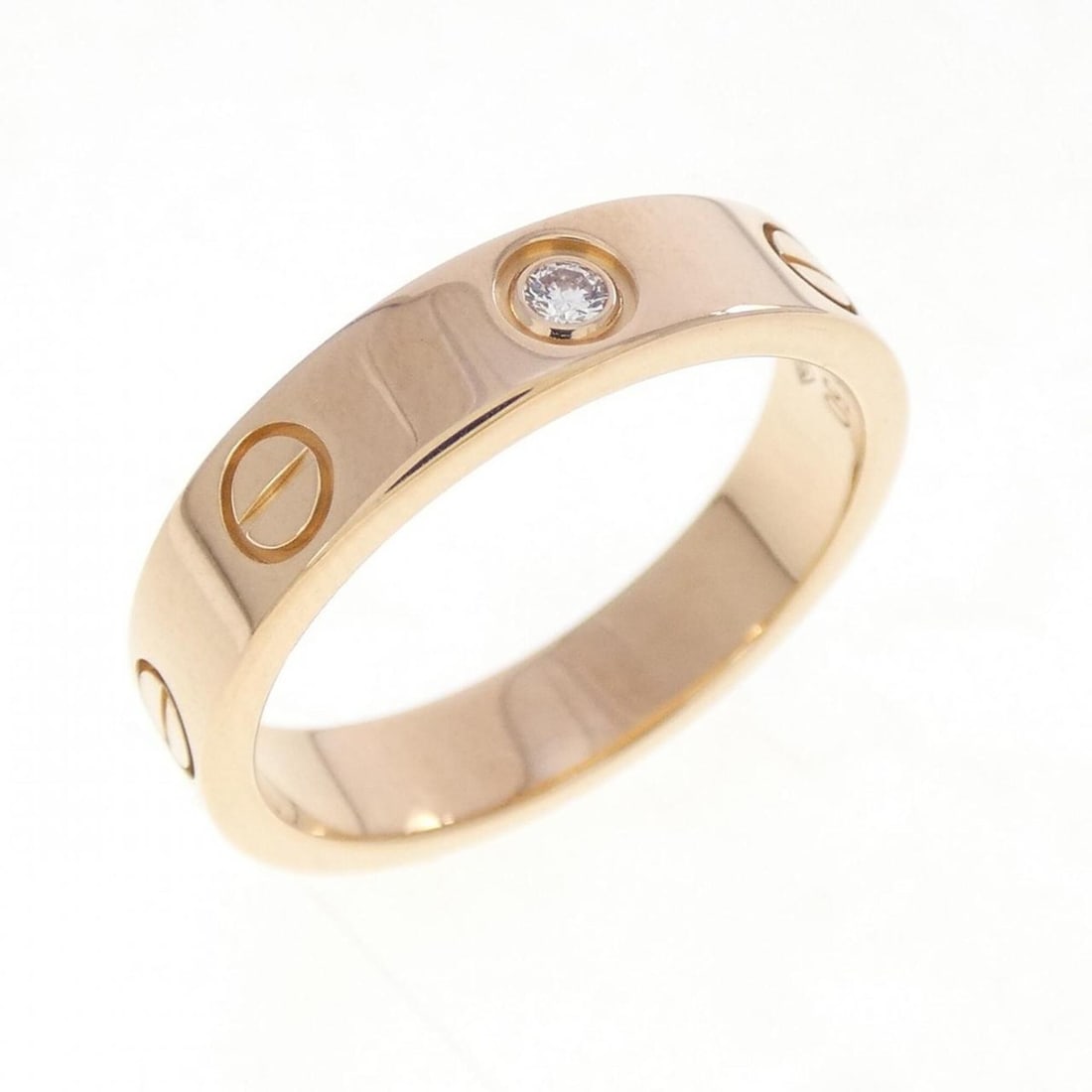 Cartier Mini Love 1P Ring: --- Catalog ---Category: SizeUS Size: 5.5Brand Size: 50Category: DesignType: Band ringColor: Pink goldStone: DiamondGender: WomenMaterial: Pink gold (18K)Category: GeneralBrand: Cartier--- Item List