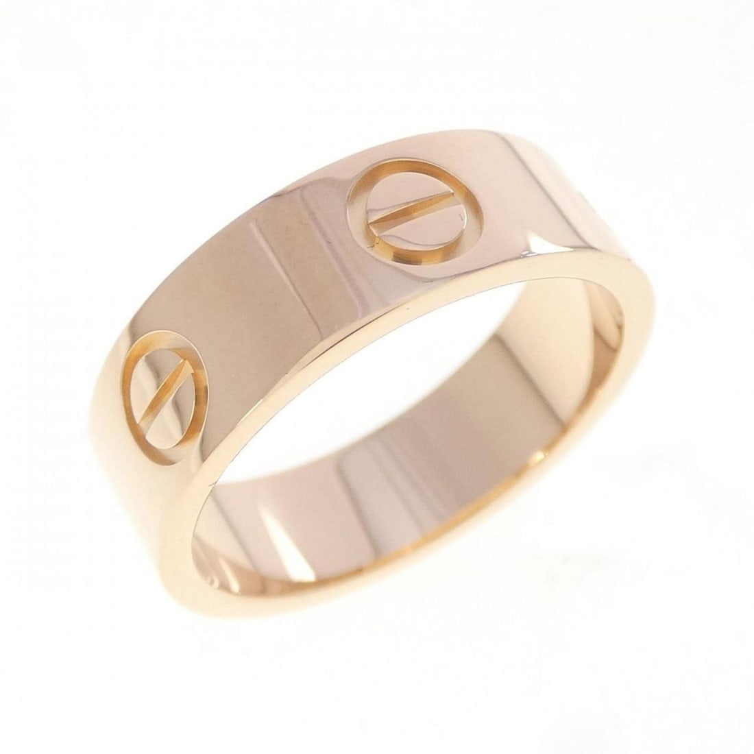 Cartier Love Ring: --- Catalog ---Category: SizeUS Size: 6Brand Size: 51Category: DesignType: Band ringColor: Pink goldGender: WomenMaterial: Pink gold (18K)Category: GeneralBrand: Cartier--- Item List ---Section:
