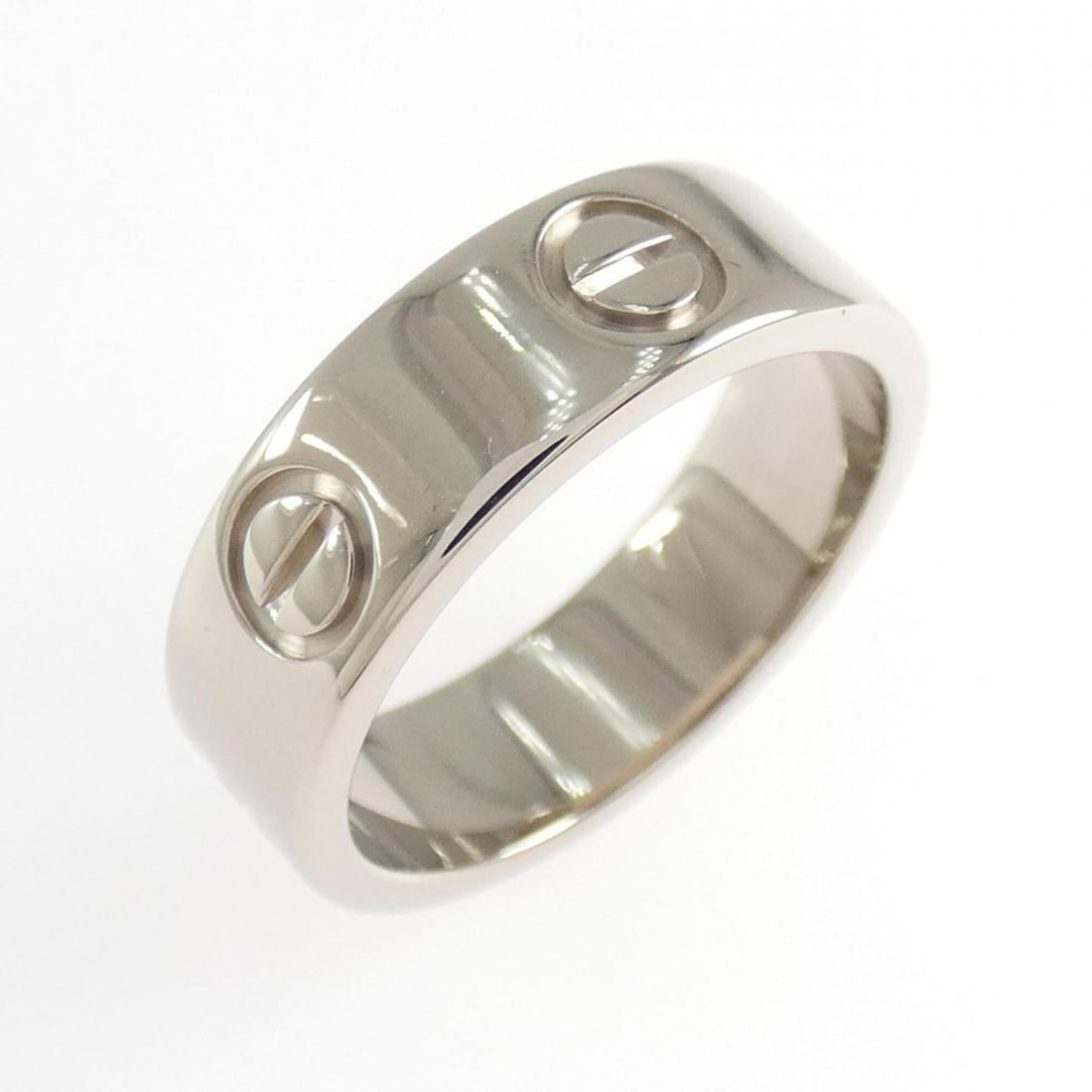 Cartier Love Ring: --- Catalog ---Category: SizeUS Size: 5.5Brand Size: 50Category: DesignType: Band ringColor: White goldGender: WomenMaterial: White gold (18K)Category: GeneralMPN: B4084700Brand: Cartier--- Item List 