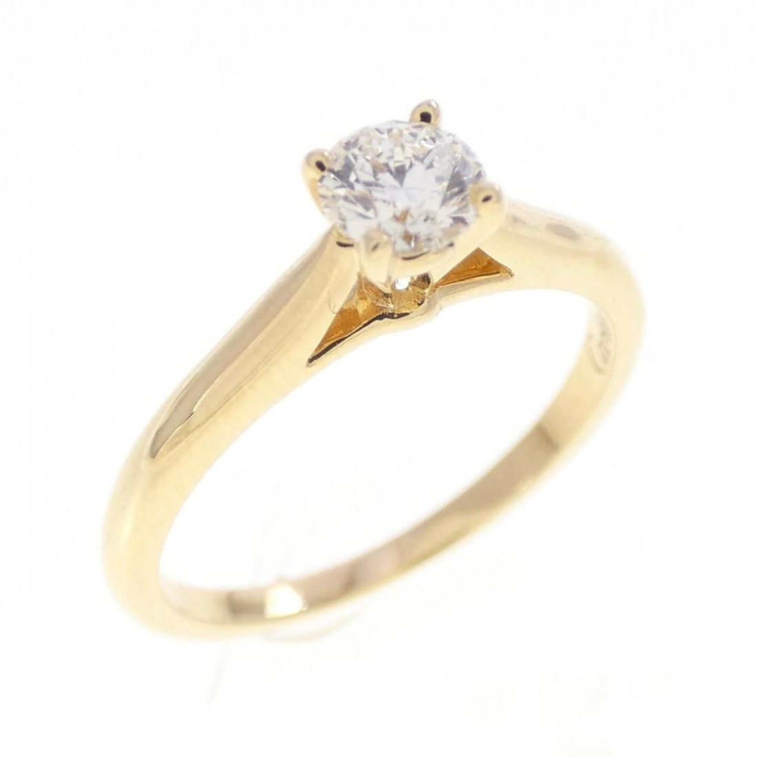 Cartier Diamond Ring 0.22CT E VS1 EXT: --- Catalog ---Category: SizeUS Size: 3.5Brand Size: 46Category: DesignType: Band ringGender: WomenMaterial: Yellow gold (18K)Category: GeneralBrand: Cartier--- Item List ---Section: