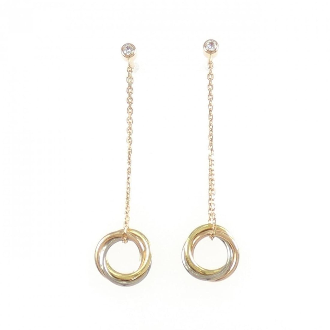 Cartier Trinity Earrings: --- Catalog ---Category: SizeSize (HxWxD): 45.20mm x 10.20mm / 1.78'' x 0.40''Category: DesignType: Stud earringsStone: DiamondGender: WomenMaterial: Pink gold (18K), White gold (18K), Yellow gold