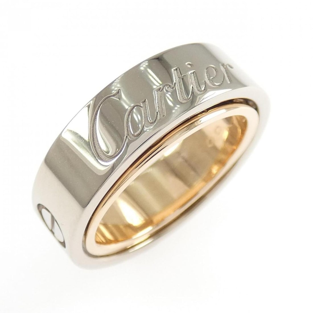 Cartier Love Secret Ring, 2005 Christmas Limited Edition Ring: --- Catalog ---Category: SizeUS Size: 4.5Brand Size: 48Category: DesignType: Band ringGender: WomenMaterial: Pink gold (18K), White gold (18K)Category: GeneralBrand: Cartier--- Item List ---Section: