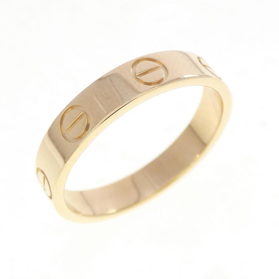 Cartier Mini Love Ring: --- Catalog ---Category: SizeUS Size: 6Brand Size: 51Category: DesignType: Band ringGender: WomenMaterial: Yellow gold (18K)Category: GeneralMPN: B4085000Brand: Cartier--- Item List ---Section: Condit