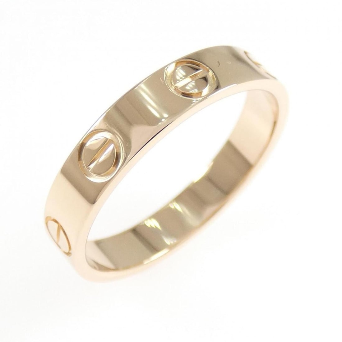 Cartier Mini Love Ring: --- Catalog ---Category: SizeUS Size: 6Brand Size: 51Category: DesignType: Band ringGender: WomenMaterial: Pink gold (18K)Category: GeneralBrand: Cartier--- Item List ---Section: ConditionRanking: