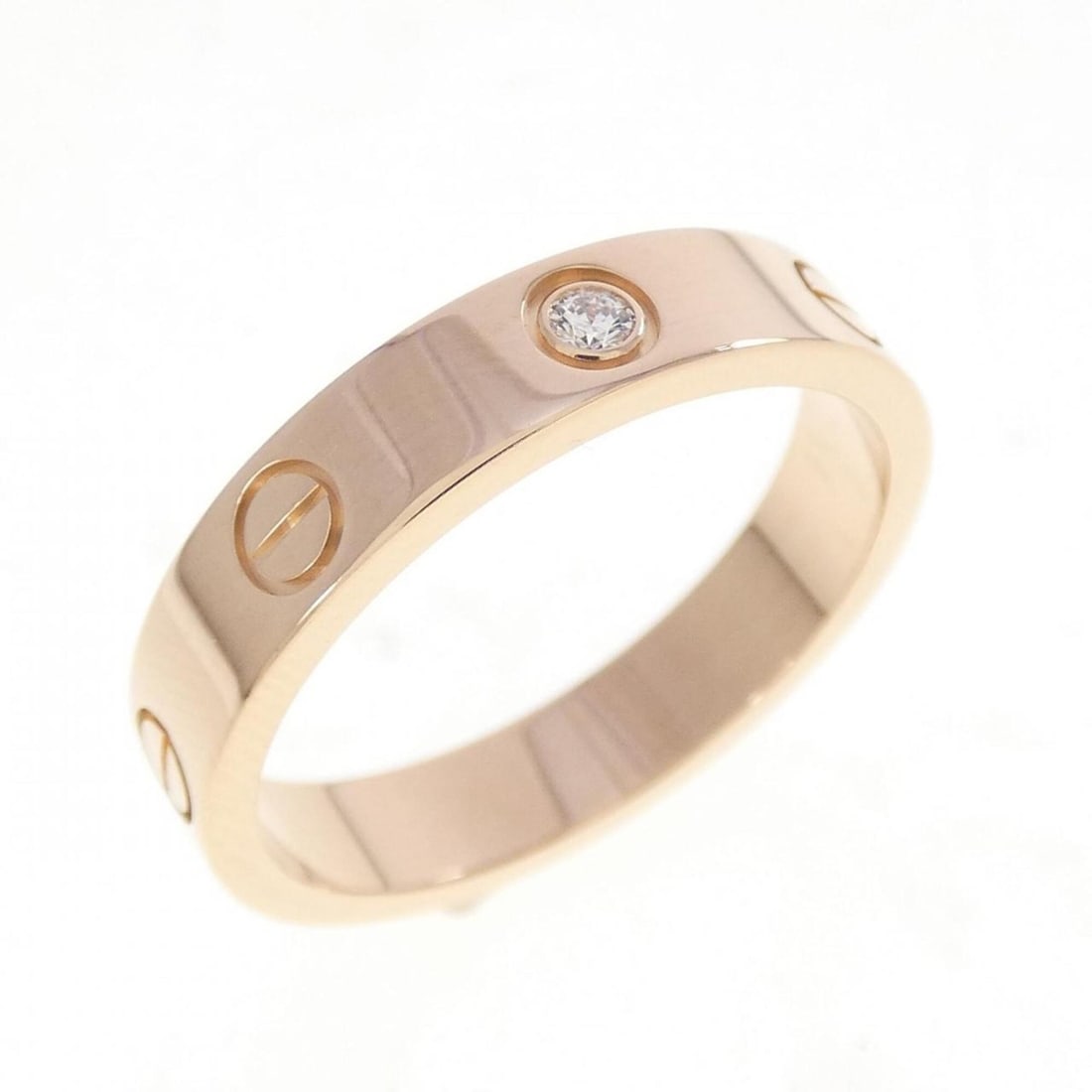 Cartier Mini Love 1P Ring: --- Catalog ---Category: SizeUS Size: 7.5Brand Size: 55Category: DesignType: Band ringGender: WomenMaterial: Pink gold (18K)Category: GeneralMPN: B4050700Brand: Cartier--- Item List ---Section: Condit