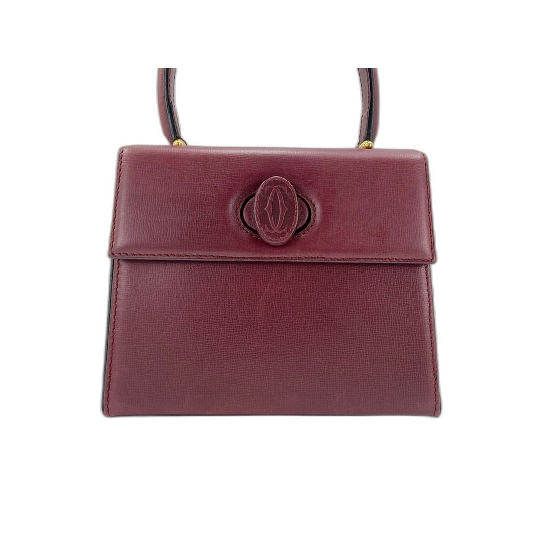 Cartier Must Line handbag, wine red: --- Catalog ---Category: SizeHandle Drop: 10.00cm / 3.94''Size (HxWxD): 15cm x 18cm x 6cm / 5.9'' x 7.08'' x 2.36''Category: DesignType: HandbagColor: Wine redGender: WomenCategory: GeneralLine: MustB