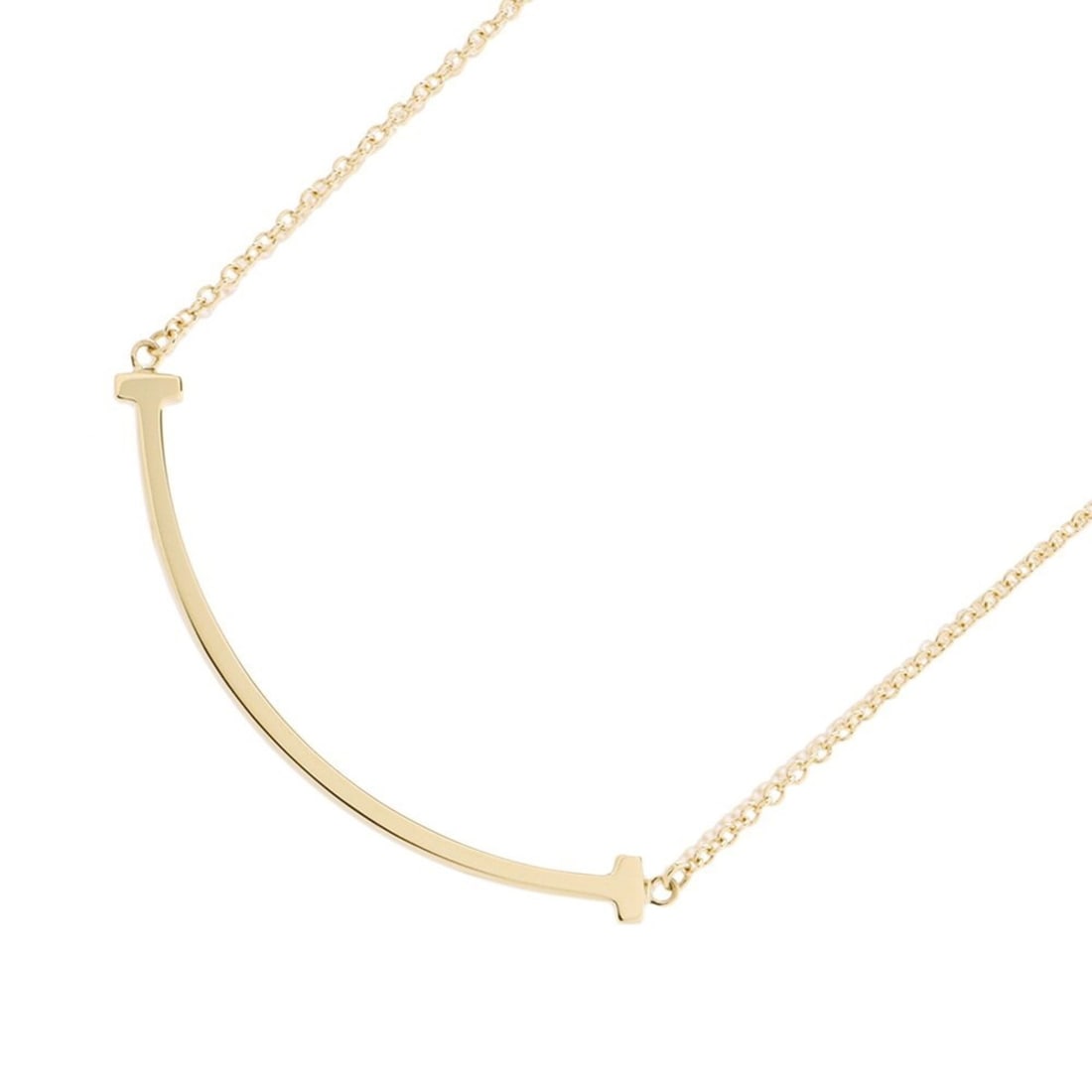 Tiffany & Co. T Smile Pendant Small Necklace, 18K Yellow Gold, 60011679.: --- Catalog ---Category: SizePendant Size: 3.5mm x 37mm / 0.13'' x 1.45''Neck Circumference: 41 cm - 45.5 cm / 16.14'' - 17.91''Category: DesignGender: WomenMaterial: Yellow gold (18K)Pendant Type: Pe