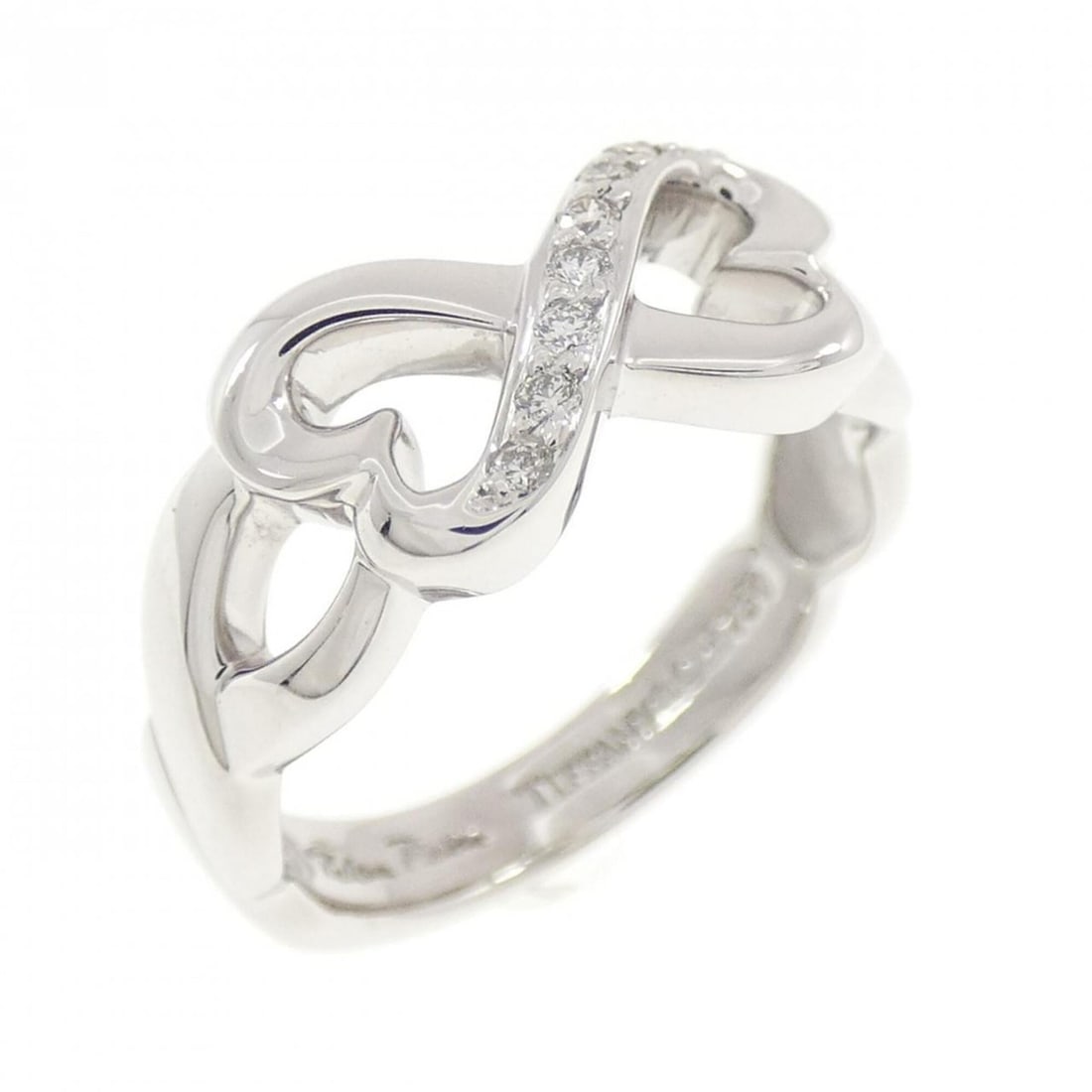 Tiffany Double Loving Heart Ring: --- Catalog ---Category: SizeJP Size: 7.5US Size: 4Category: DesignType: Band ringGender: WomenMaterial: White gold (18K)Category: GeneralBrand: Tiffany--- Item List ---Section: ConditionRanking: