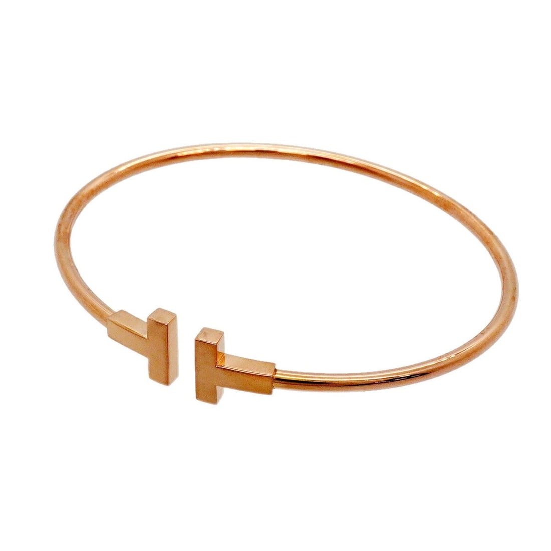 Tiffany & Co. T-Wire Bangle, 18K Pink Gold, Women's: --- Catalog ---Category: SizeLength: 17cm / 6.69''Category: DesignType: BangleGender: WomenMaterial: Pink gold (18K)Category: GeneralBrand: Tiffany--- Item List ---Section: ConditionRanking: Rank AB U