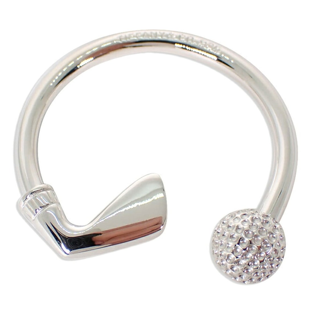 Tiffany & Co. 925 Golf Keyring: --- Catalog ---Category: SizeSize (HxWxD): 3.49cm x 3.41cm / 1.37'' x 1.34''Category: DesignType: KeyringGender: WomenMaterial: Sterling silver 925Category: GeneralBrand: Tiffany--- Item List ---Secti