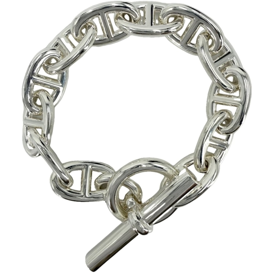 Hermes Chaine d'Ancre TGM bracelet for men, 12 links, sterling silver (925), approximately 107.7g.: --- Catalog ---Category: SizeWidth: 1.4cm / 0.55''Length: 18cm / 7.08''Weight: 107.7g / 3.79oz.Category: DesignType: Charm braceletGender: MenMaterial: Silver 925Category: GeneralBrand: Hermes--- Item