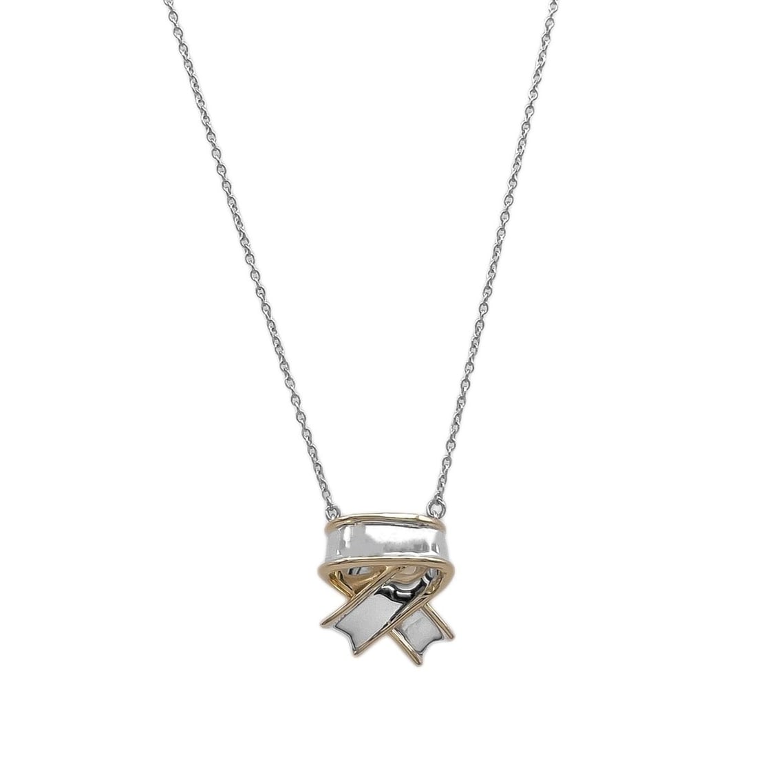 TIFFANY&Co. Tiffany Cross Ribbon Combination Necklace SV925 K18YG Silver Women's: --- Catalog ---Category: SizePendant Size: 14mm x 13mm / 0.55'' x 0.51''Neck Circumference: 42.5 cm / 16.73''Category: DesignColor: Gold, SilverGender: WomenMaterial: Silver 925, Yellow gold (18K)Neck