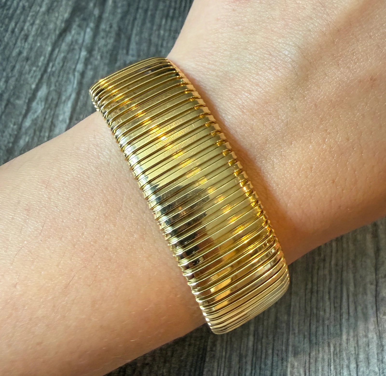 Wide Vintage Tubogas Bracelet in 14K Gold, 6.75?? Long: Metal: 14K Yellow Gold Weight: 39.8 gramsMeasurements: 7.25 inches long (fits like a 6.75” bracelet due to design) by 19.3 mm wideMarkings: "14K ITALY"Condition: In good condition with some mino