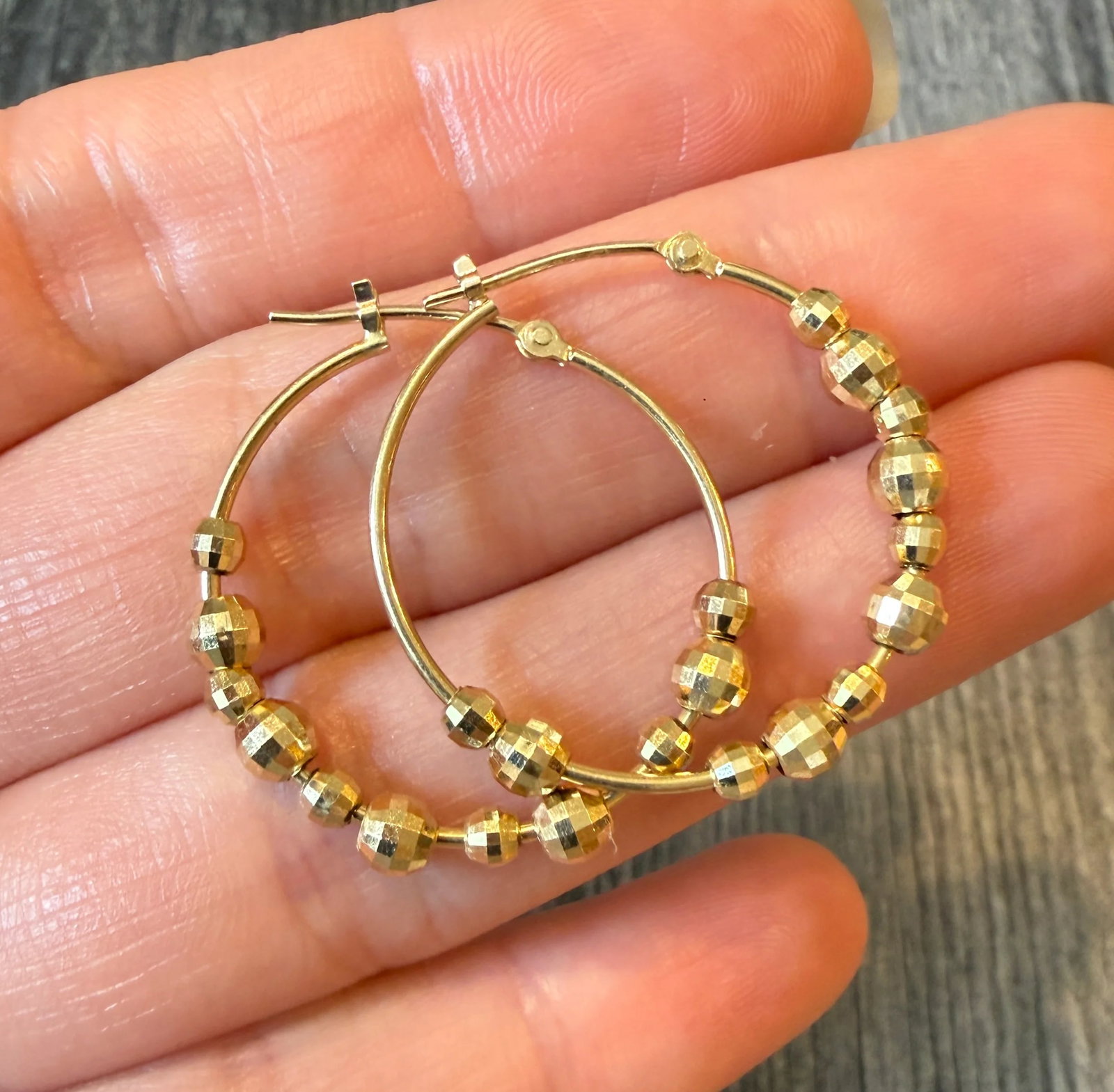 Gold Bead 14K Gold Hoop Earrings (S): Metal: 14K Yellow Gold (acid tested)Weight: 1.7 gramsMeasurement: 1.1 inches long Markings: “14K”Condition: In very good condition with some minor surface wear.Follow us on Instagram @alphaome