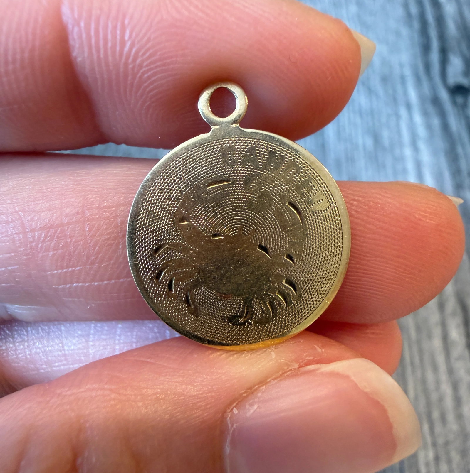 Vintage Cancer Zodiac Charm in 14K Gold: Metal: 14K Yellow Gold (acid tested)Weight: 2.4 gramsMeasurements: 0.75 inch diameterInscribed: “Happy 13th, Love Lou & Mom"Condition: In good condition with some fading and surface wear. A bale can