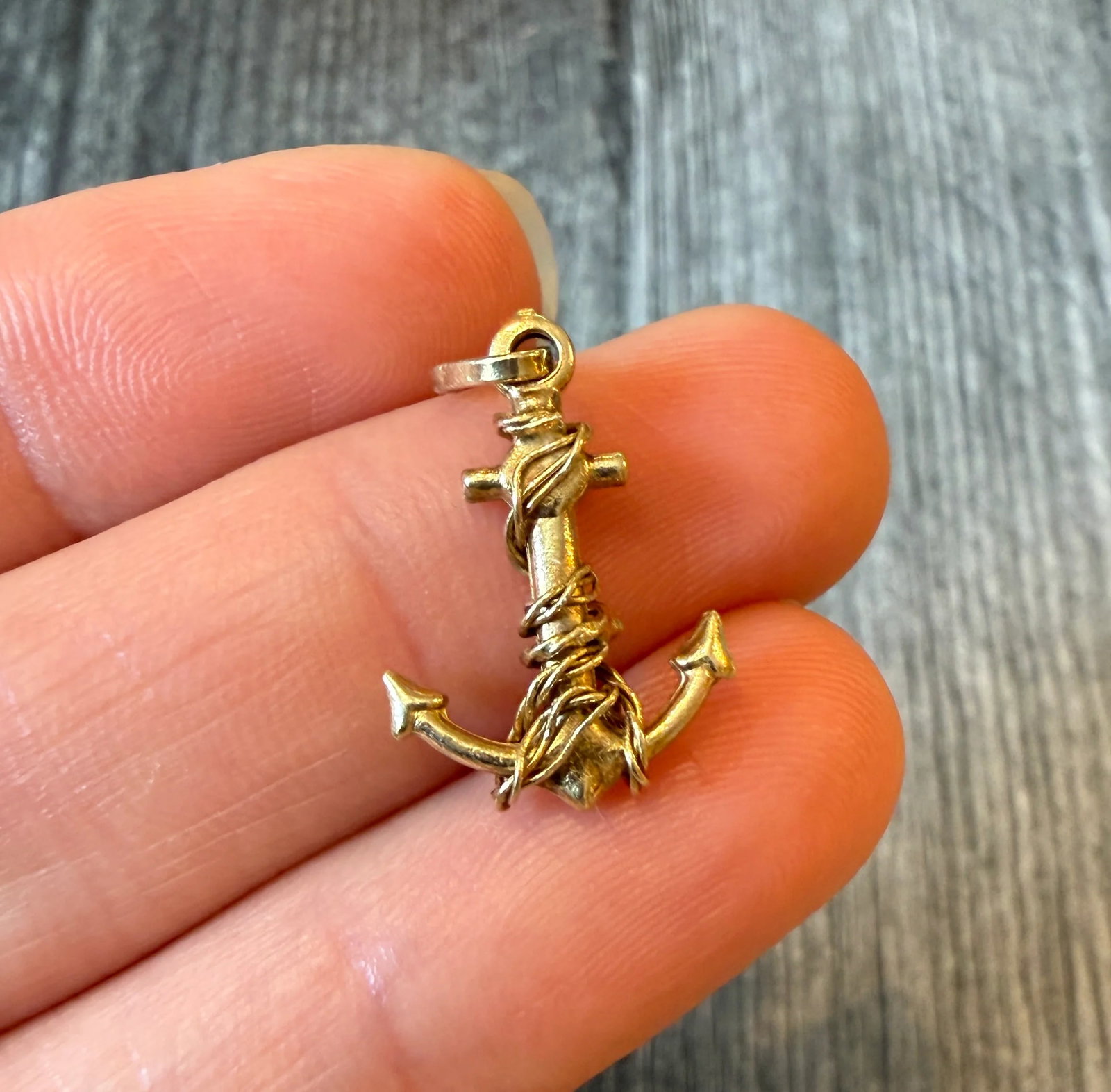 Small 14K Gold Anchor Charm: Metal: 14K Yellow Gold Weight: 1.1 gramsMeasurements: 0.65 inches long by 0.55 inches wideMarkings: "14KT ITALY"Condition: In very good condition with some minor surface wear.Follow us on Instagram @a