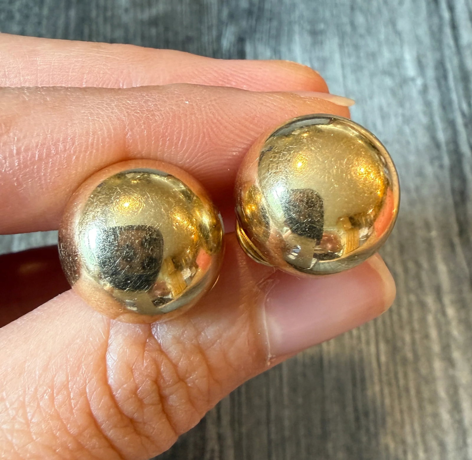 Dome or Button Earrings in 14K Gold: Metal: 14K Yellow Gold Weight: 5.6 gramsMeasurements: 0.65 inch diameter Markings: "14KP"Condition: In good condition with some minor surface wear and scratchesFollow us on Instagram @alphaomegajewelr