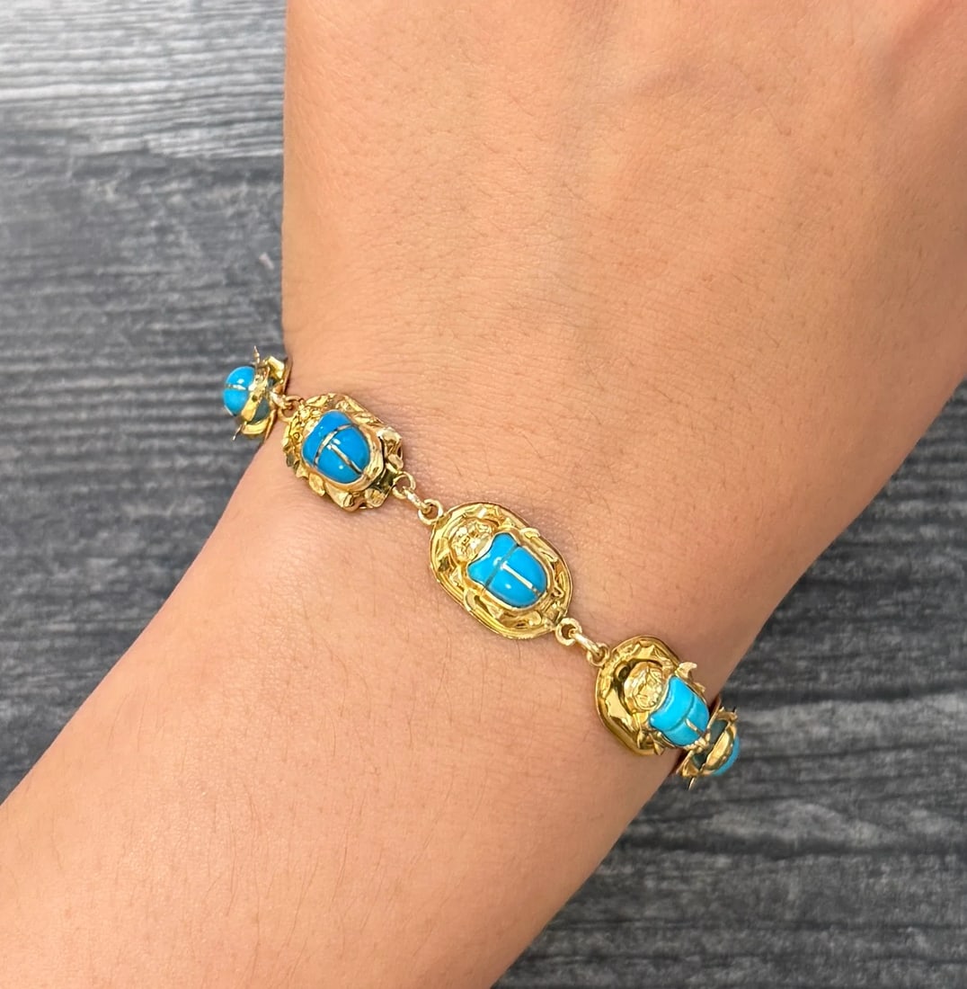 Carved Turquoise and 18K Gold Egyptian Scarab Bracelet, 7.25" Long: Metal: 18K Yellow Gold Bracelet (acid tested) with 14K Gold ClaspWeight: 10.1 gramsMeasurements: 7.25 inches long by 10.5 mm wideMarkings: "14Kt ITALY" on claspCondition: In good condition with some i
