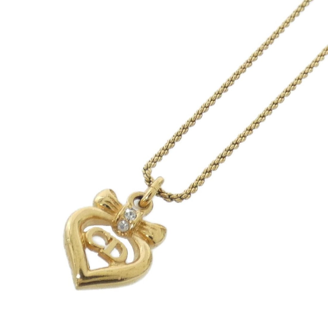 Christian Dior necklace: --- Catalog ---Category: SizePendant Size: 21mm x 14mm / 0.82'' x 0.55''Neck Circumference: 40 cm - 44 cm / 15.74'' - 17.32''Category: DesignColor: Clear, GoldGender: WomenNecklace Type: