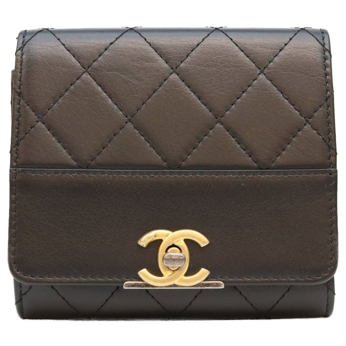 CHANEL No. 29 Black Calfskin Turnlock Matelassé Trifold Wallet (with coin purse) Gold and Silver: --- Catalog ---Category: SizeSize (HxWxD): 11cm x 11.5cm x 2cm / 4.33'' x 4.52'' x 0.78''Category: DesignType: Wallet (tri-fold)Color: BlackGender: WomenMaterial: Leather Leather/Fur Type: CalfskinCat