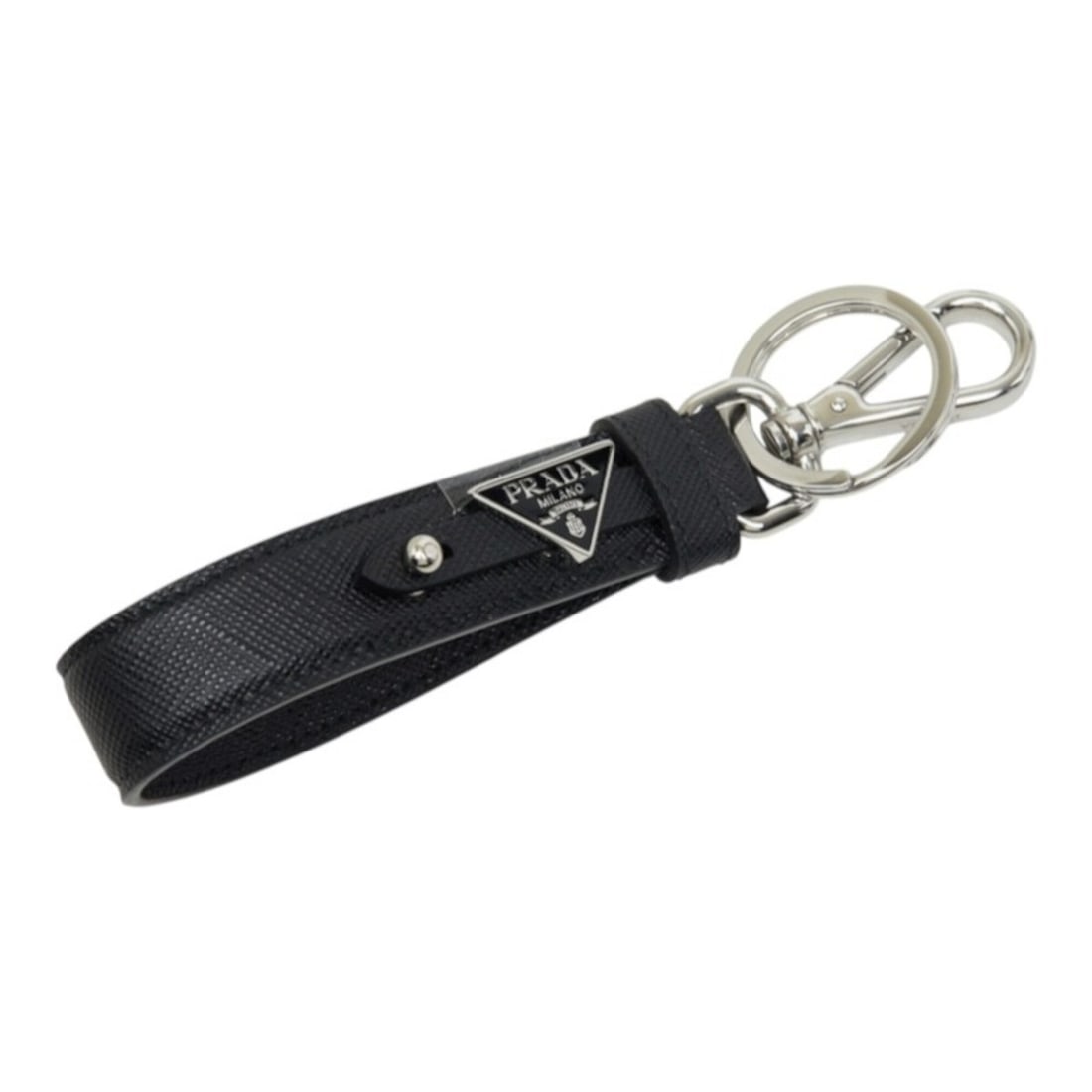Prada Triangle Logo Plate Keyring Keychain Accessory Bag Charm Black Saffiano Leather Women's PRADA: --- Catalog ---Category: SizeSize (HxWxD): 14cm x 2cm / 5.51'' x 0.78''Category: DesignType: KeyringColor: BlackGender: WomenMaterial: LeatherLeather/Fur Type: Saffiano leatherCategory: GeneralBrand: 