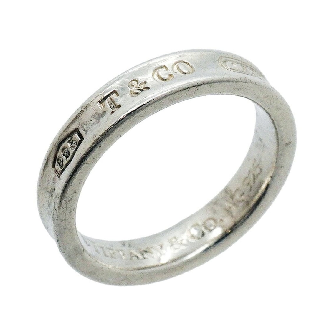 Tiffany & Co. Narrow Ring, Sterling Silver 925, Size 10, Women's: --- Catalog ---Category: SizeJP Size: 10US Size: 5.5Category: DesignType: Band ringGender: WomenMaterial: Silver 925Category: GeneralBrand: Tiffany--- Item List ---Section: ConditionRanking: Rank B Us