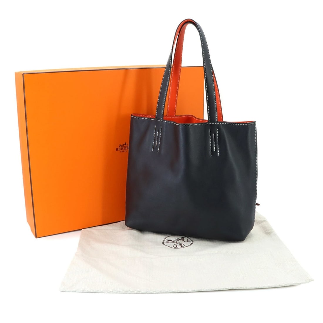 Hermes Double Sens 28 Reversible Tote Handbag, Sikkim Orange Black, X Stamp: --- Catalog ---Category: SizeWeight: 415g / 14.63oz.Size (HxWxD): 26cm x 34cm x 9.5cm / 10.23'' x 13.38'' x 3.74''Handle Length: 46cm / 18.11''Category: DesignType: Handbag, Tote bagColor: Black, Oran