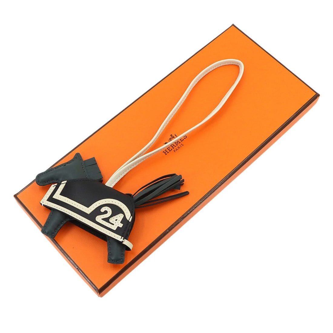 Hermes Rodeo Robeo 24 PM Accessory Bag Charm, Agneau Milo Vert Mangrove Black Craie, K Stamp.: --- Catalog ---Category: SizeWeight: 12.9g / 0.45oz.Chain Length: 190.00mm / 7.48''Size (HxWxD): 70.00mm x 125.00mm / 2.76'' x 4.92''Category: DesignType: Handbag charmColor: Black, VertGender: WomenM