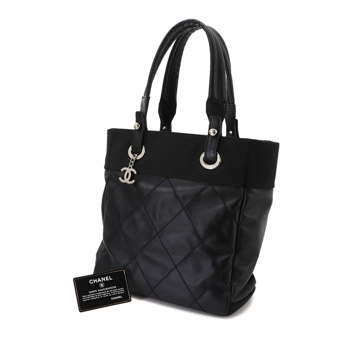 Chanel Paris Biarritz PM Tote Handbag, Nylon and Leather, Black, A34208, Silver Hardware: --- Catalog ---Category: SizeWeight: 680g / 1.49lb.Size (HxWxD): 26.5cm x 25.5cm x 11cm / 10.43'' x 10.03'' x 4.33''Handle Length: 44cm / 17.32''Category: DesignType: Handbag, Tote bagColor: BlackGend