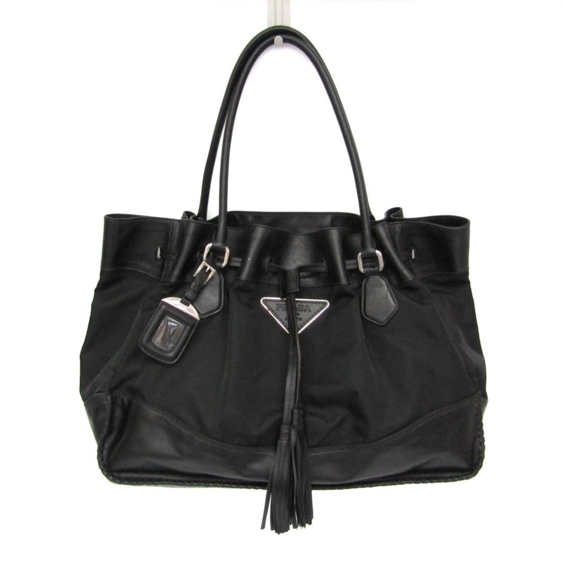 Prada Tessuto Soft BR3555 Men,Women Nylon,Leather Tote Bag Black: --- Catalog ---Category: SizeSize (HxWxD): 29cm x 39cm x 15cm / 11.41'' x 15.35'' x 5.9''Handle Length: 54cm / 21.25''Category: DesignType: Tote bagColor: BlackGender: Men,WomenClosure: