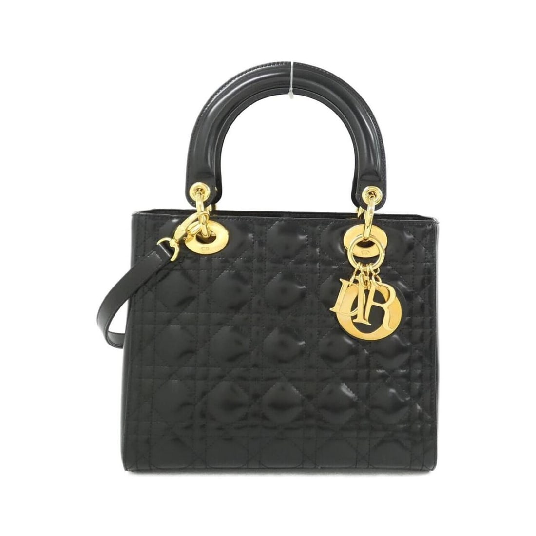 Christian Dior Lady Medium Handbag: --- Catalog ---Category: SizeSize (HxWxD): 20cm x 24cm x 10cm / 7.87'' x 9.44'' x 3.93''Category: DesignType: HandbagColor: BlackGender: WomenMaterial: Leather Category: GeneralBrand: Christian