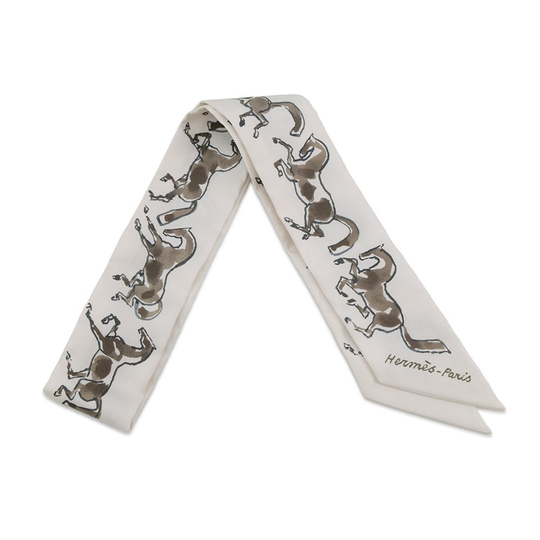 Hermes scarf muffler twilly "Chevaux en Liberte" (Free Horse) HERMES silk twill 2021 SCARF TWILLY: --- Catalog ---Category: SizeSize (LxW): 5cm x 86cm / 1.96'' x 33.85''Category: DesignType: ScarfColor: Bronze, WhiteGender: WomenSeason: Fall/winterMaterial: Silk 100%Category: GeneralLine: TwillyBra