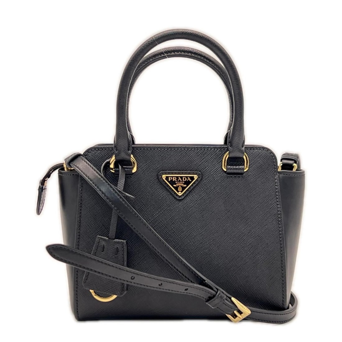 PRADA Saffiano Leather Triangle Logo Handbag 1BA906 Shoulder Bag Black Women's: --- Catalog ---Category: SizeSize (HxWxD): 14.5cm x 18cm x 8.5cm / 5.7'' x 7.08'' x 3.34''Strap Length: 110cm / 43.3''Handle Length: 27cm / 10.62''Category: DesignType: Handbag, Shoulder bagColor: Bla
