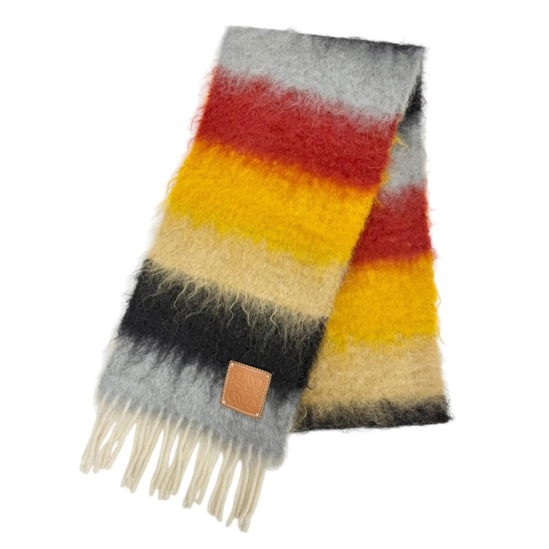 LOEWE Mohair Wool Anagram Leather Patch Striped Fringe Long Stole/Scarf, Multicolor, Made in Spain,: --- Catalog ---Category: SizeSize (LxW): 1.83m x 22cm / 72.04'' x 8.66''Category: DesignType: StoleColor: Multi-colorGender: WomenMaterial: Mohair , Wool , Nylon Category: GeneralBrand: LoeweCountry o