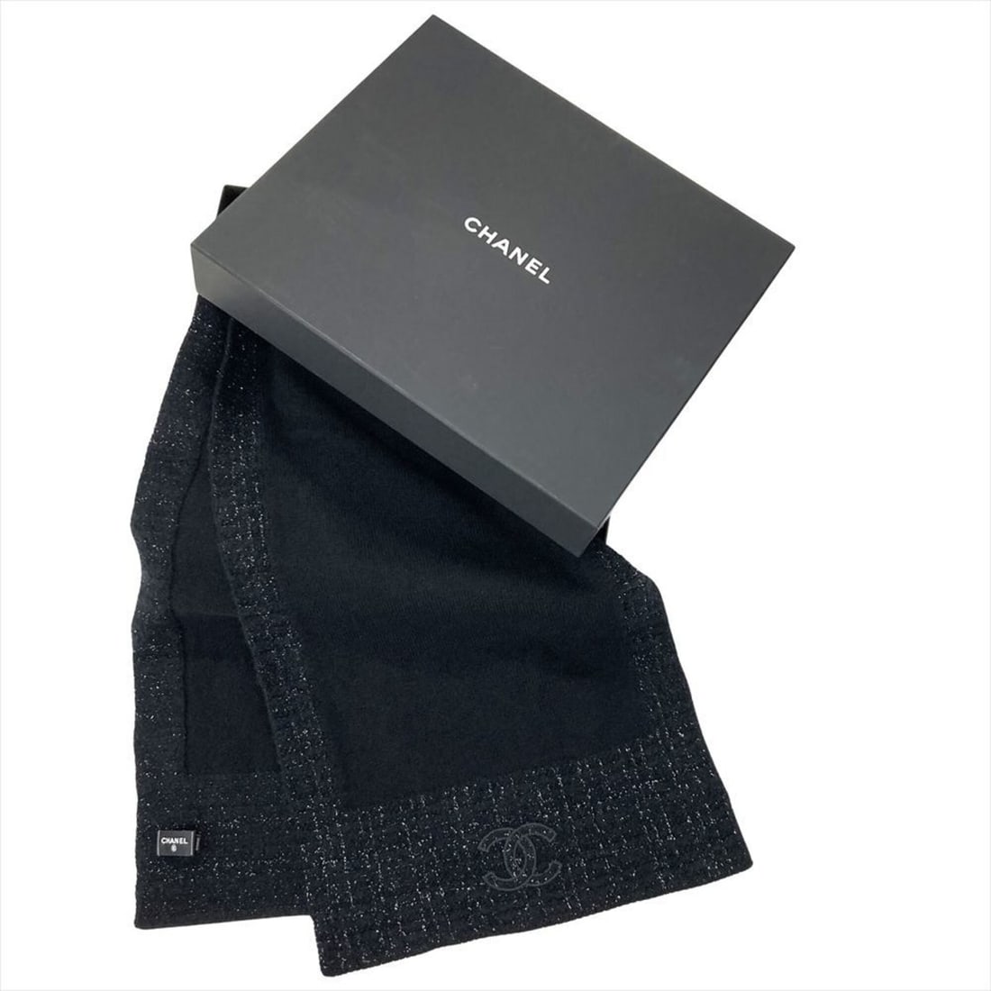 Chanel Coco Mark Glitter Scarf, Cashmere and Silk, 20.7cm, Black, E7XCPG2C, Women's: --- Catalog ---Category: SizeSize (LxW): 2.06m x 37cm / 81.49'' x 14.56''Category: DesignType: StoleColor: BlackGender: WomenMaterial: Cashmere 97%, Silk 1%, Polyamide 1%Category: GeneralBrand: Chanel