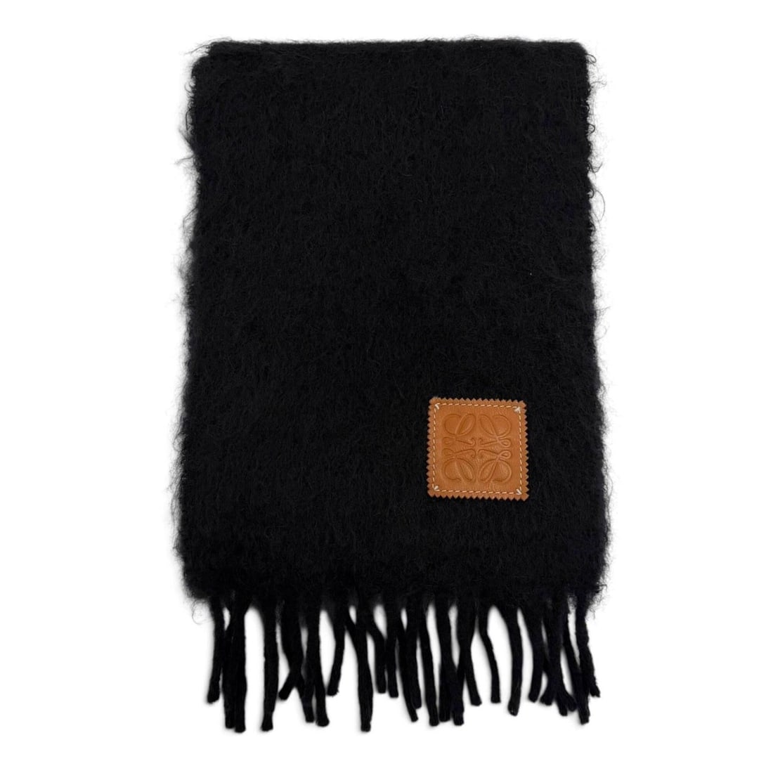 LOEWE mohair wool stole/scarf with anagram logo, leather patch, and fringe, black, made in Spain,: --- Catalog ---Category: SizeSize (LxW): 1.82m x 21.5cm / 71.65'' x 8.46''Category: DesignType: StoleColor: BlackGender: Men,WomenMaterial: Mohair , Wool , Nylon , Leather Category: GeneralBrand: Loew