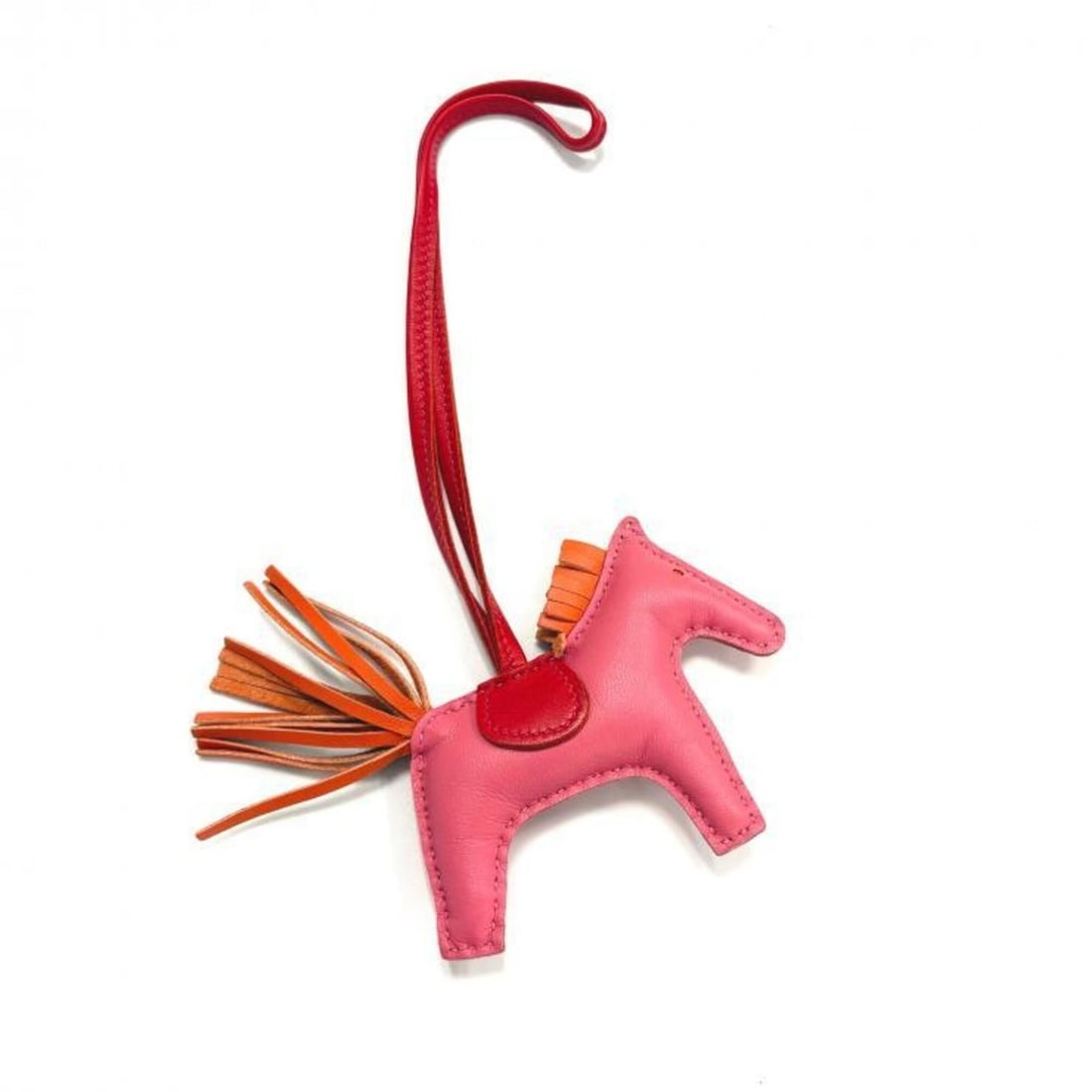 Hermes Agneau Milo Rodeo PM Bag Charm Rose Azalee Orange Poppy Rouge Indian: --- Catalog ---Category: DesignType: Handbag charmColor: PinkGender: Men,WomenMaterial: Agneau MiloCategory: GeneralBrand: Hermes--- Item List ---Section: ConditionRanking: Rank AB Used - Traces of us
