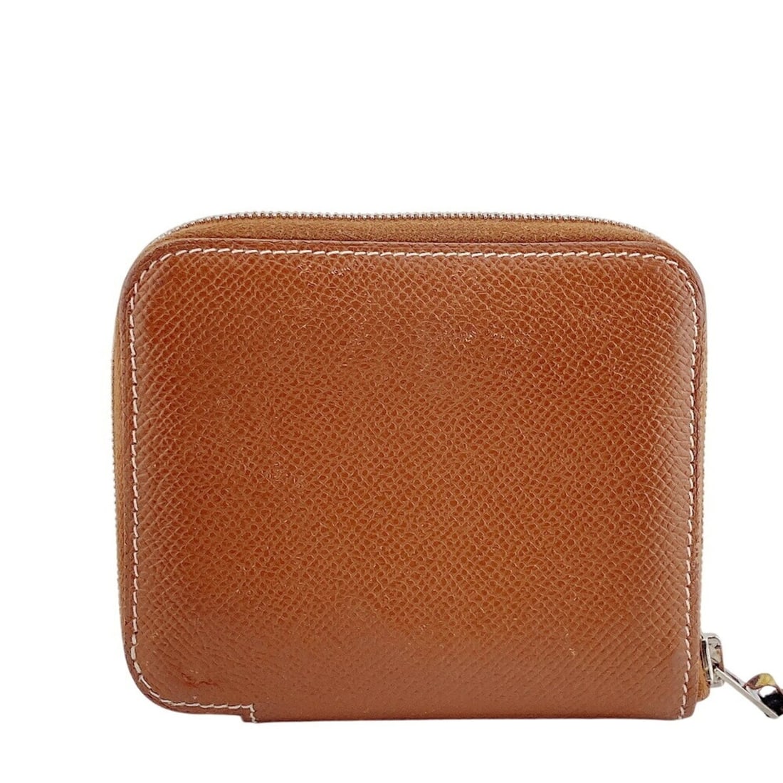 HERMES Azap Compact Silk In Wallet Lion Coin Case Brown: --- Catalog ---Category: SizeSize (HxWxD): 10cm x 11cm / 3.93'' x 4.33''Category: DesignType: Coin purse/coin caseColor: BrownGender: WomenMaterial: Leather Category: GeneralBrand: Hermes--- Item