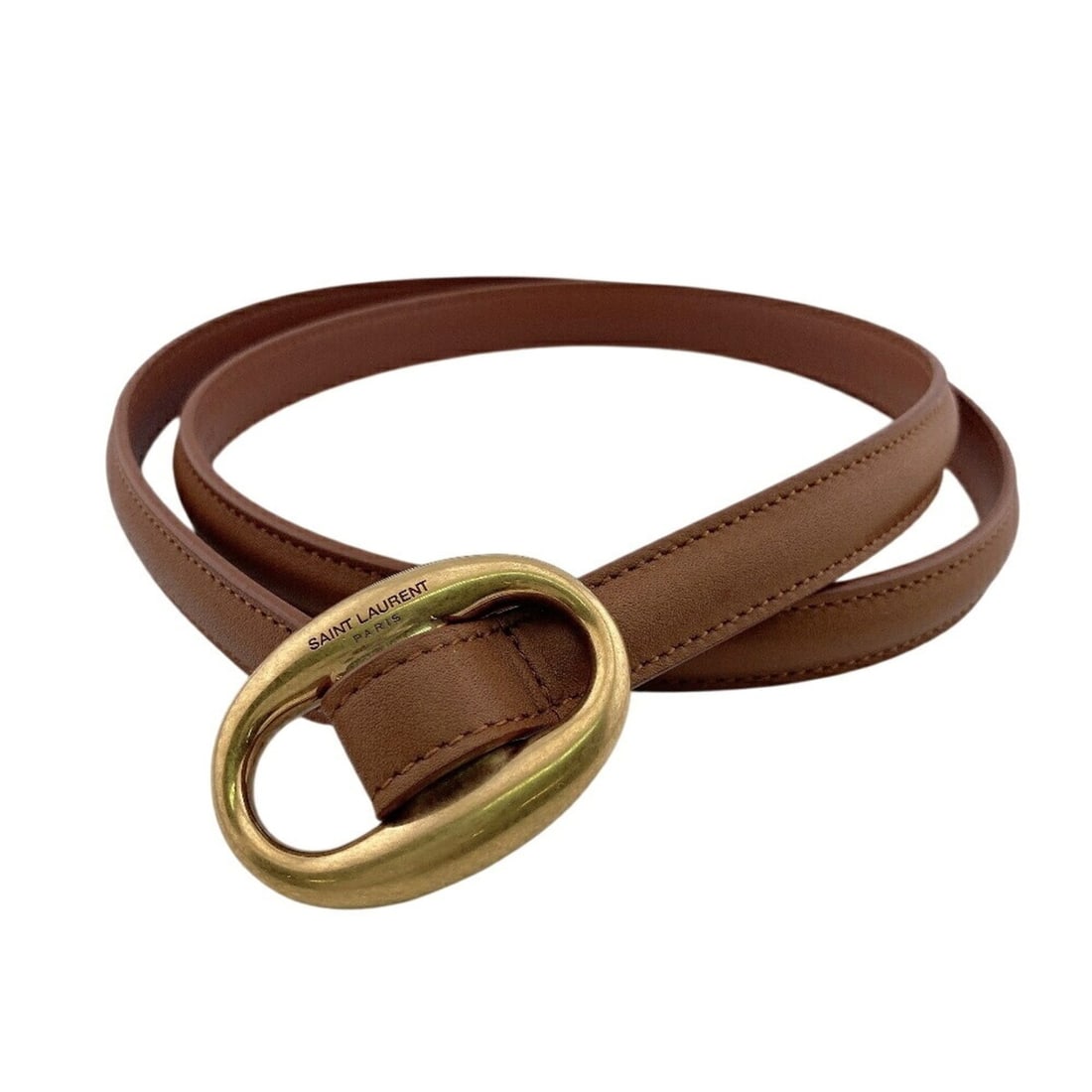 Yves Saint Laurent SAINT LAURENT PARIS 756409 Narrow Belt with Engraved Oval Buckle, Brown: --- Catalog ---Category: SizeWidth: 1.5cm / 0.59''Length: 86cm / 33.85''Category: DesignType: Standard beltColor: GoldGender: WomenMaterial (Strap): Leather Category: GeneralBrand: Yves Saint
